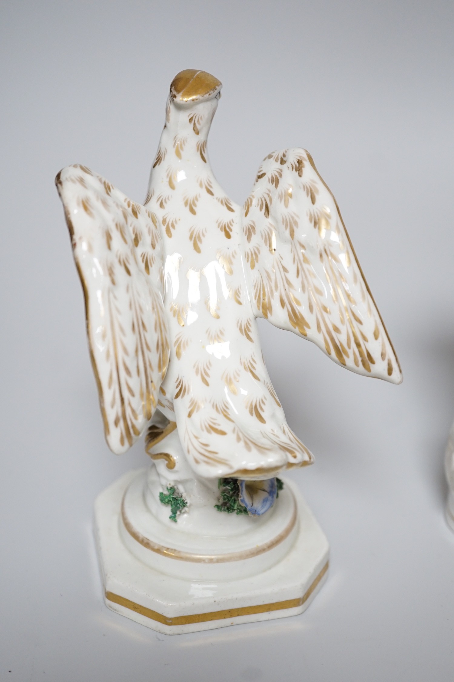 A Worcester milk jug, c.1780, a Newhall-type cream jug, c.1795, a Staffordshire porcelain model of an eagle, c.1830-40, 17cm high, and two Staffordshire porcellaneous models